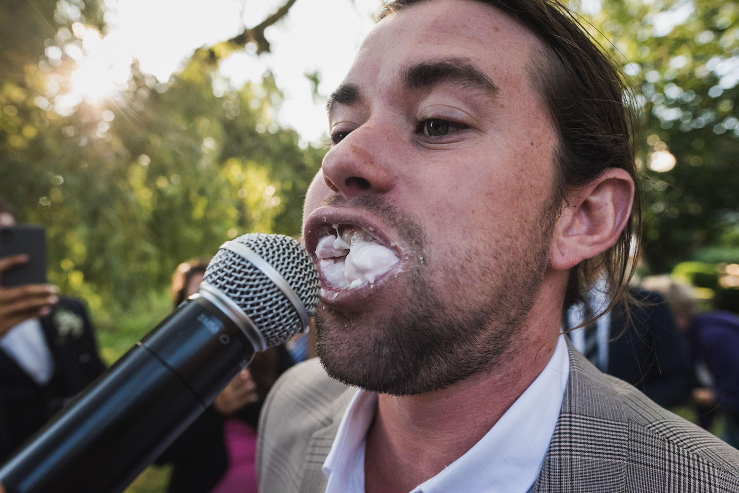 chubby bunny game at outdoor wedding, Carine Bea Photography