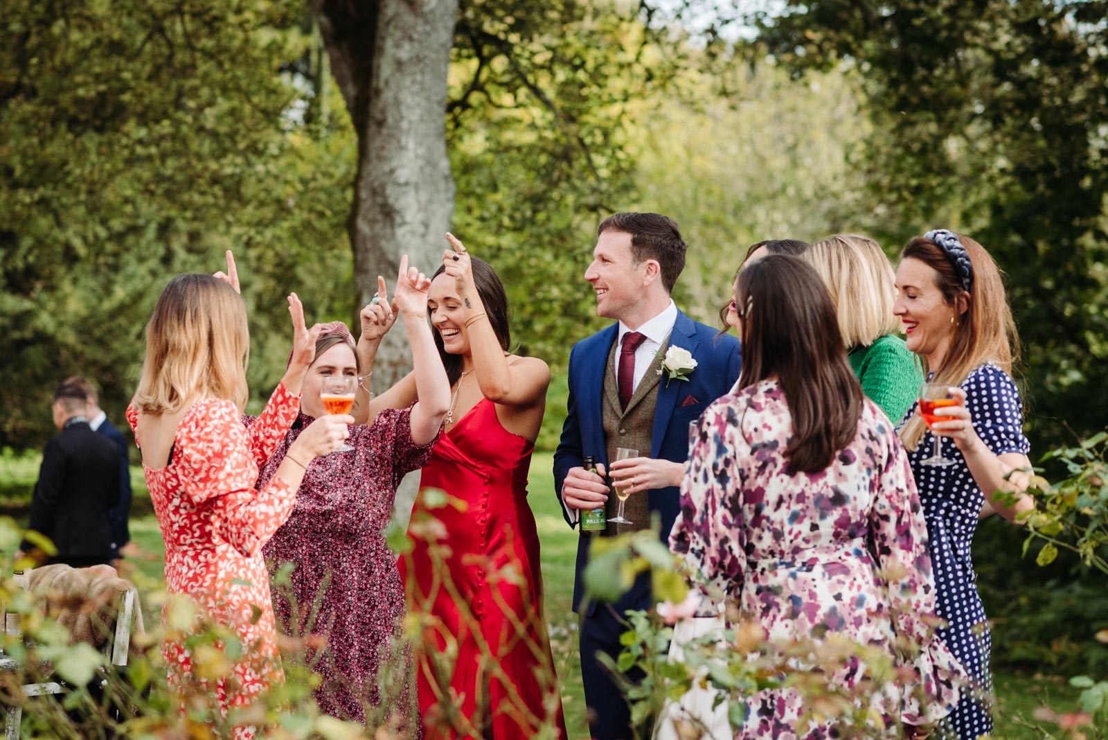 wedding guests dancing in the garden in Buckinghamshire countryside