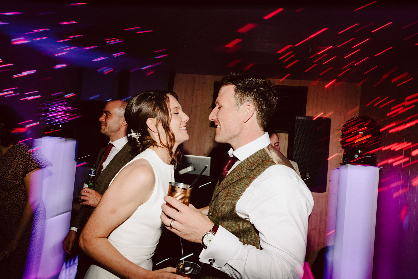 awesome couple having fun in their wedding party in nether winchendon house